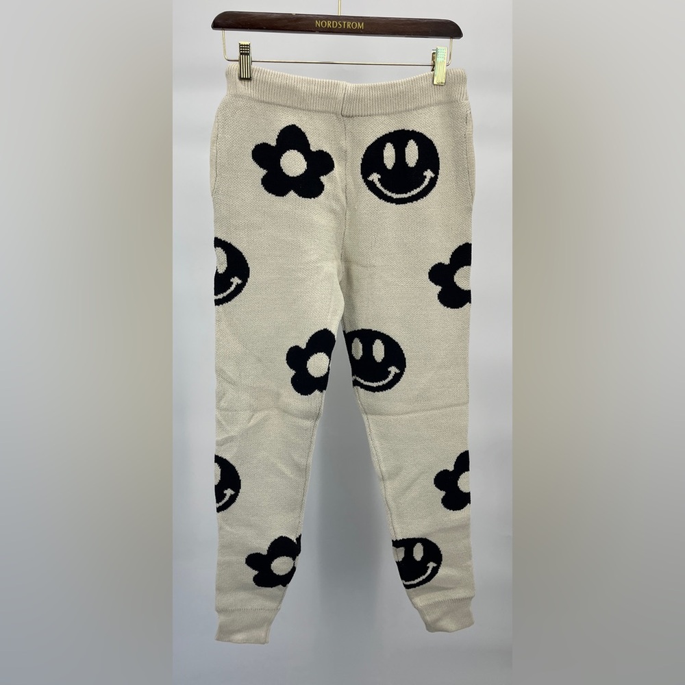 Women’s Dressed in LALA Off White and Black Smiley Face Cropped Jogger Pants - Picture 6 of 8